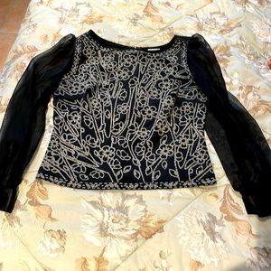 Gorgeous hand beaded blouse for a special event. Very elegant.